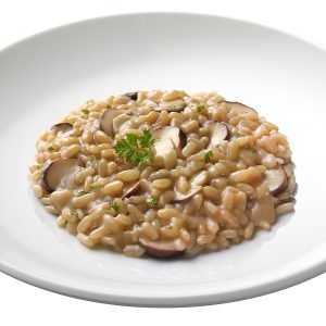 Risotto ai Funghi con riso Carnaroli e funghi selezionati.